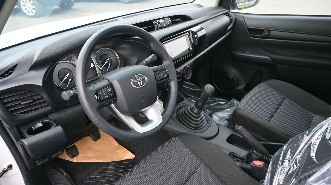 تويوتا هيلوكس Toyota Hilux 2024 Single Cab 2.4L Diesel Transmission Manual 5 Cargo Hooks White outside Black insid