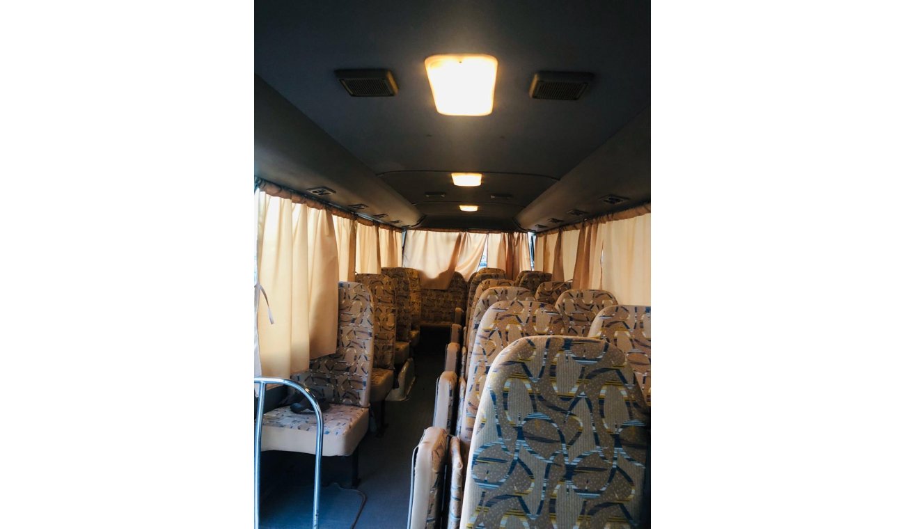 Toyota Coaster 30 Seater - Full Air Condition - Clean interior & exterior - Special price for ANGOLA