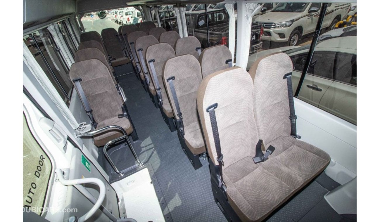 Toyota Coaster 22 Seater with Snorkel, 3 Point Seatbelt, Fridge, Mic System, Green Laminated Glass , Heater and Coo