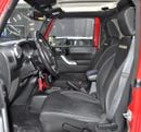Jeep Wrangler EXCELLENT DEAL for our Jeep Wrangler Sahara ( 2014 Model ) in Red Color GCC Specs