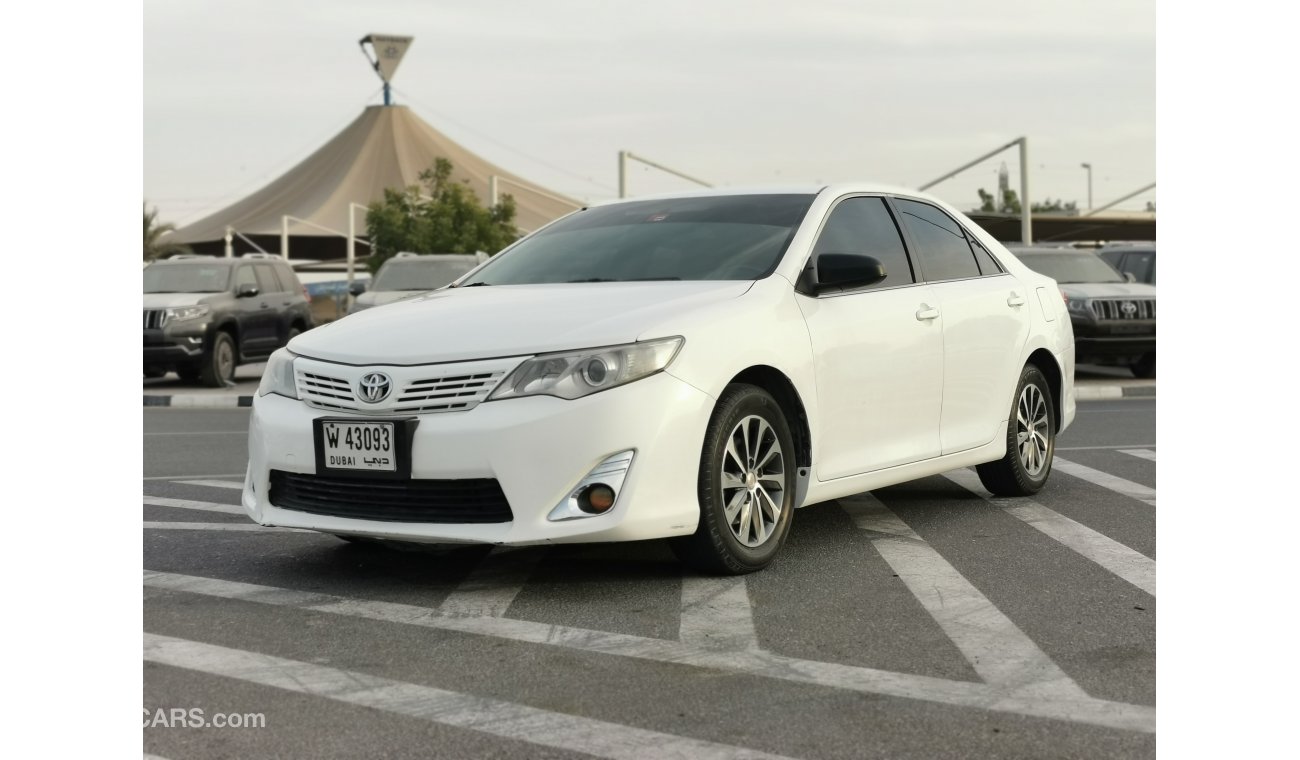 Toyota Camry 2.5L, Leather Seats, DVD + Rear DVD, Alloy Rims 16'', Rear AC, Wooden Interior (LOT # TCW2014)