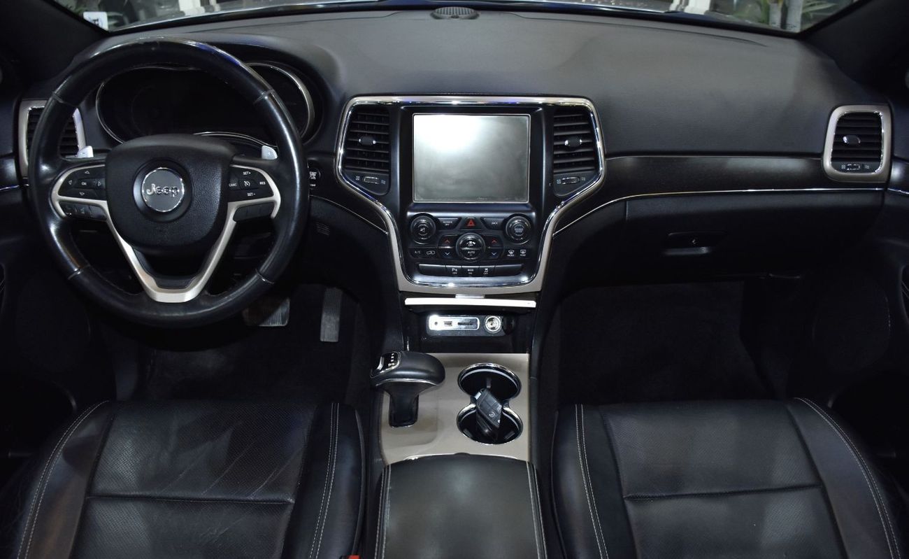 Jeep Grand Cherokee EXCELLENT DEAL for our Jeep Grand Cherokee Limited 4x4 ( 2015 Model ) in Silver Color GCC Specs