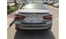 Toyota Camry TOYOTA_CAMERY_GRANDE_2023_3.5L_avaialable_white_black_hybrid
