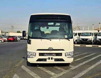 تويوتا كوستر 23 SEATER / 2.8L DIESEL A/T / AUTO DOOR/ HLF LUGGAGE RACK / PWR WINDOWS (CODE#COD28B)