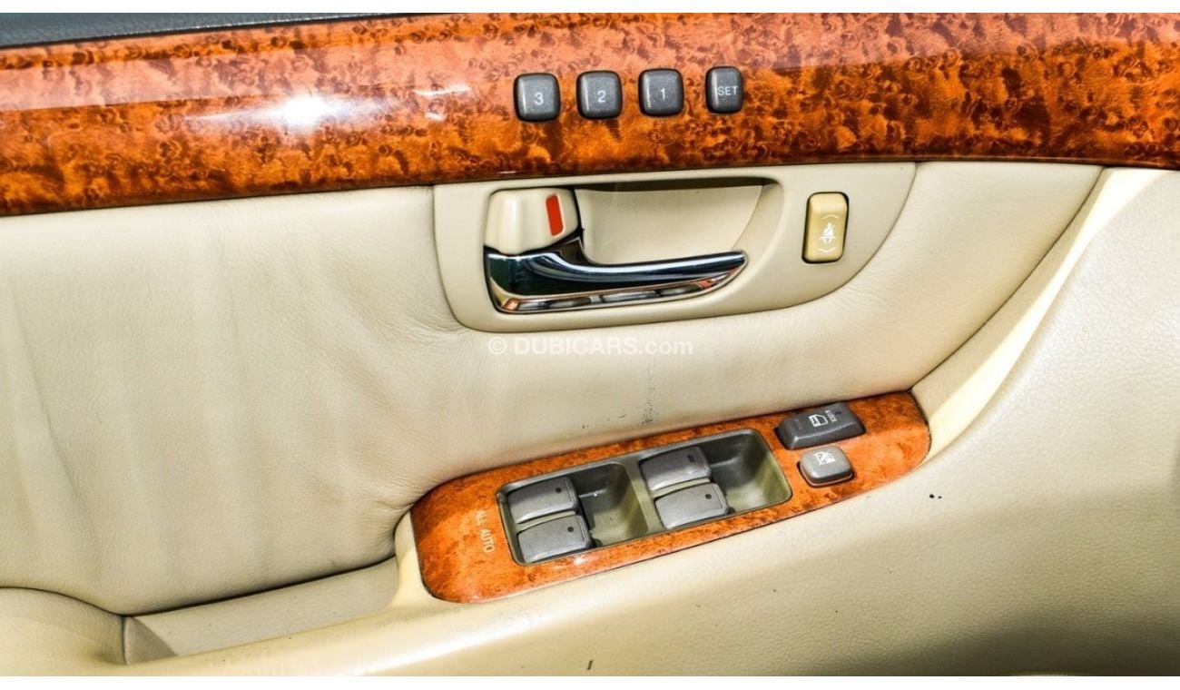 Lexus LS 430 Imported 1/2 Ultra, model 2006, white color, leather opening, wooden wheels, electric mirrors, excel