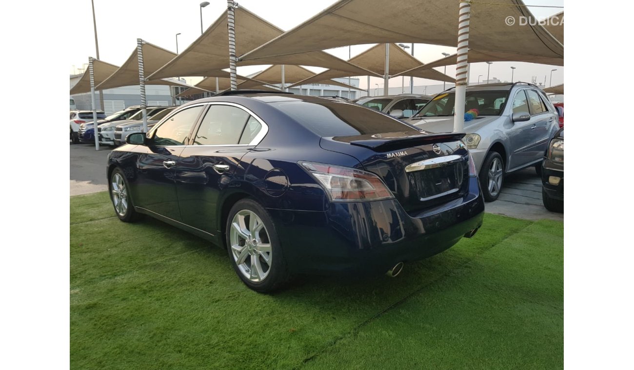 Nissan Maxima GCC Number One - Full Option - sunroof - Leather - Back Wing - Screen - Sensors -Excellent condition