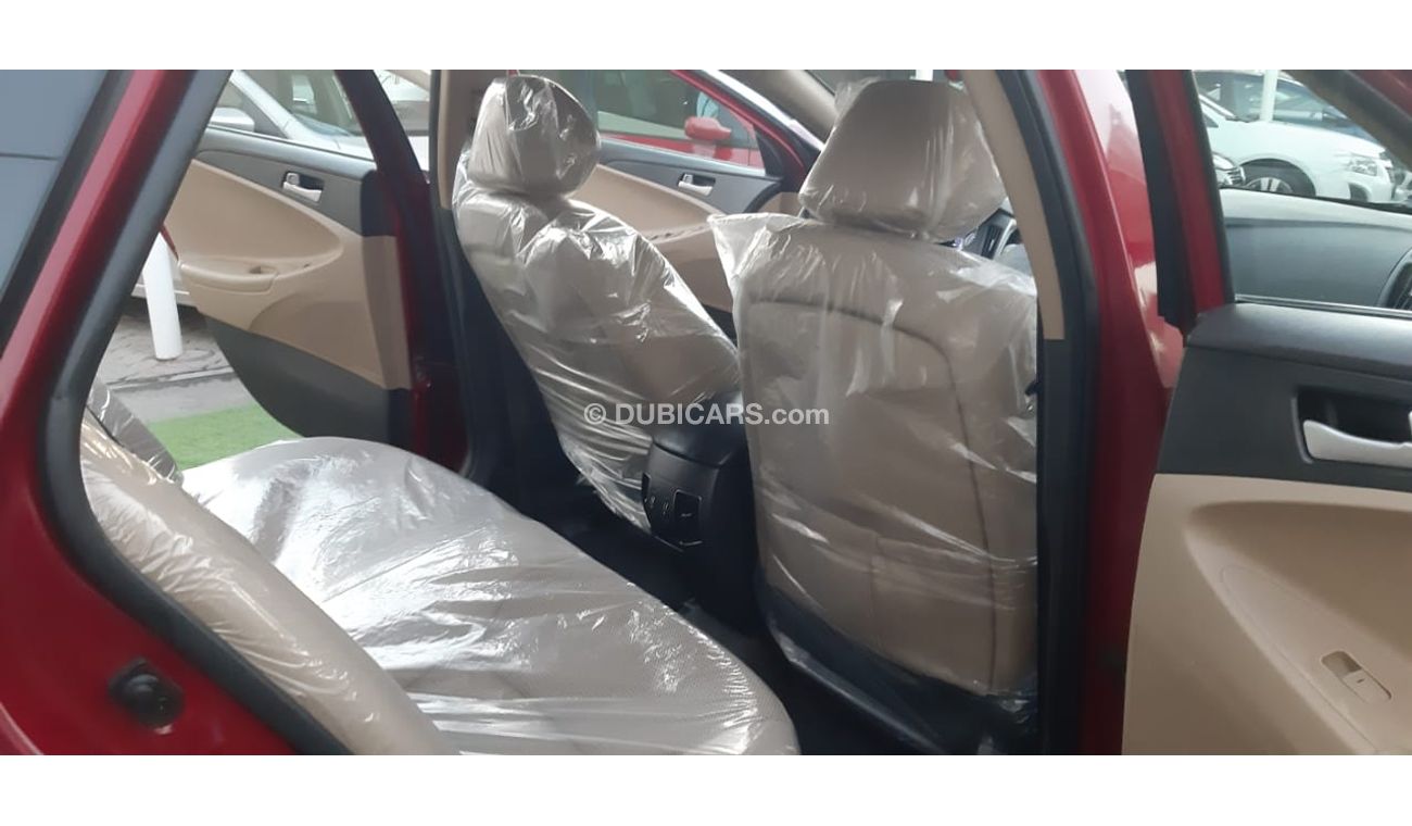 هيونداي سوناتا خليجى -2013 رنجات - مشغل اقراص - نوافذ كهربائية لون أحمر داخل رصاصى بحالة ممتازة لاتحتاج لاى مصاريف