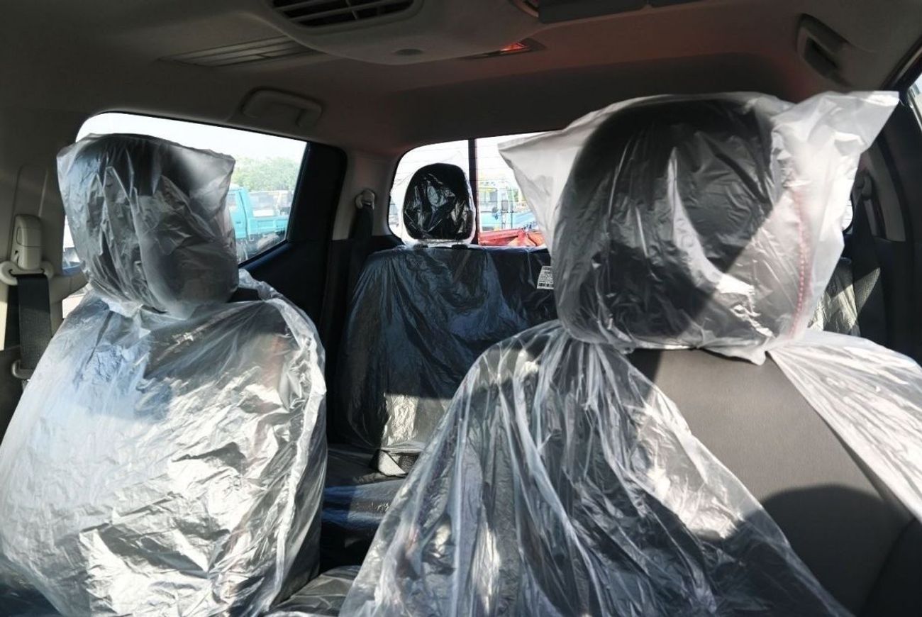 ميتسوبيشي L200 ميتسوبيشي L200 ديزل فل أوبتيون أوتوماتيك 2.4 لتر برتقالي من الخارج أسود من الداخل