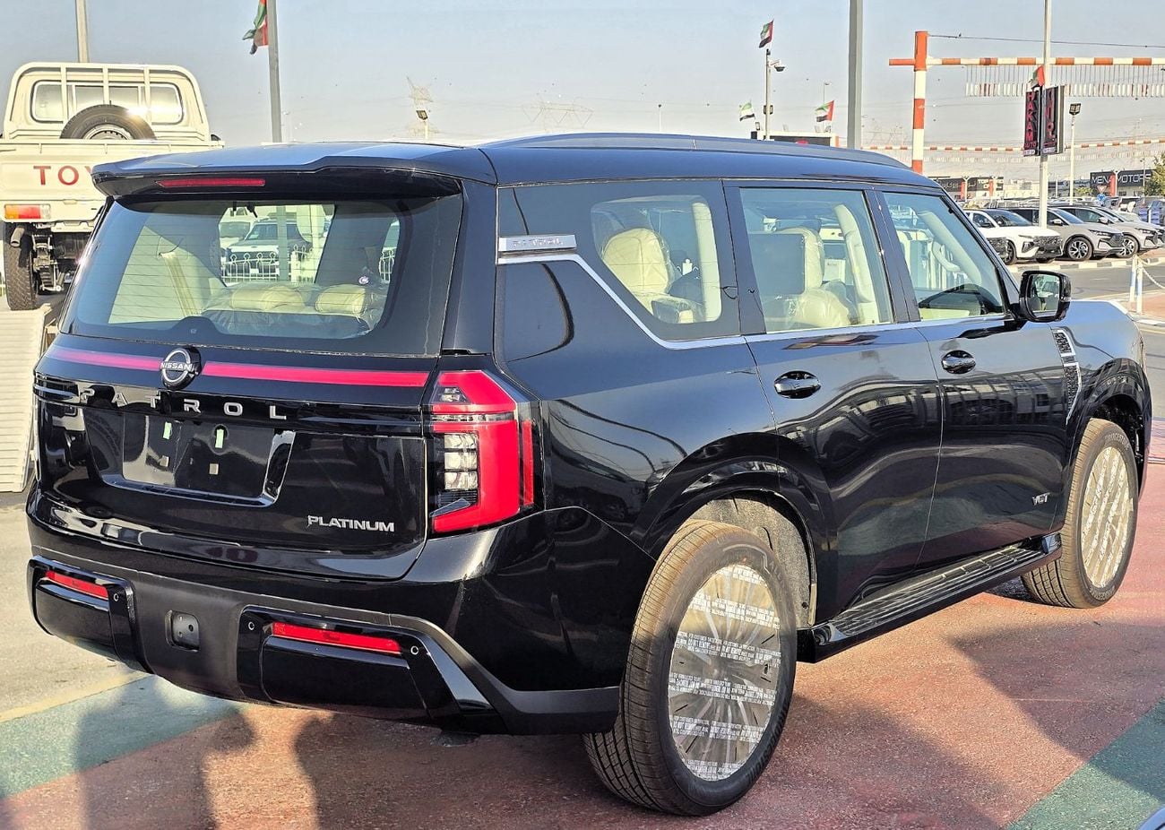 Nissan Patrol LE PLATINUM CITY Nissan patrol platinum full option 3.5l T A/T V6  4WD Gcc black color inside beige