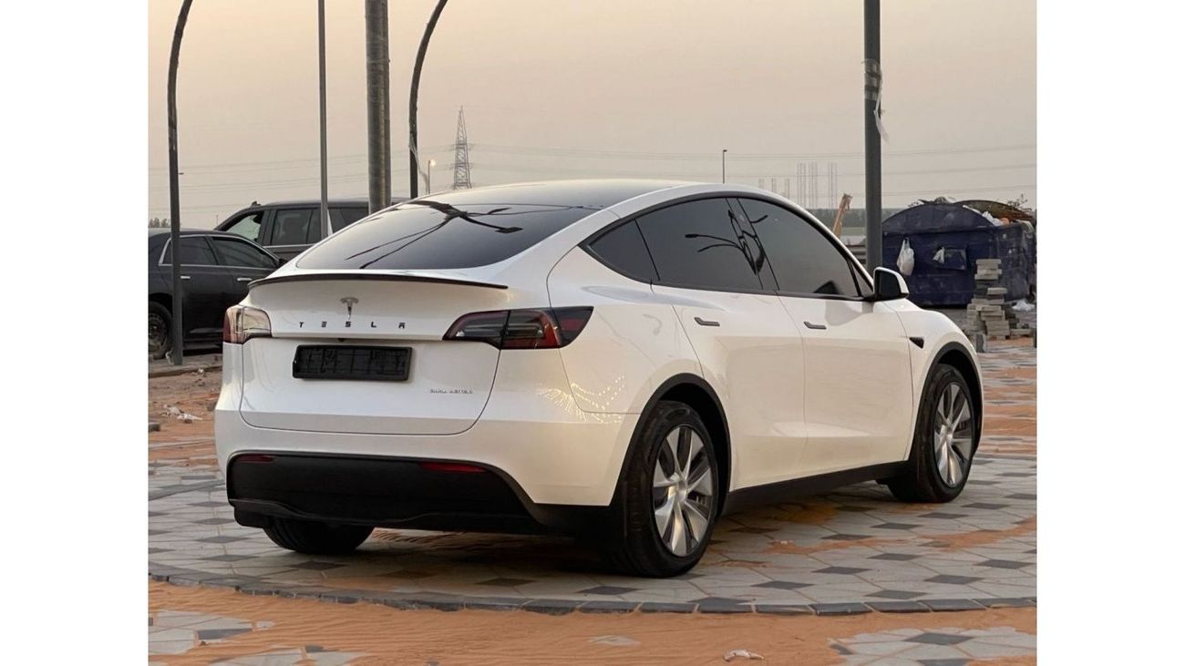 Tesla Model Y TESLA MODEL Y LONG RANGE DUAL MOTOR MODEL : 2023 MILEAGE : 24,000 km PRICE : 172,000 DIRHAMS Gulf sp