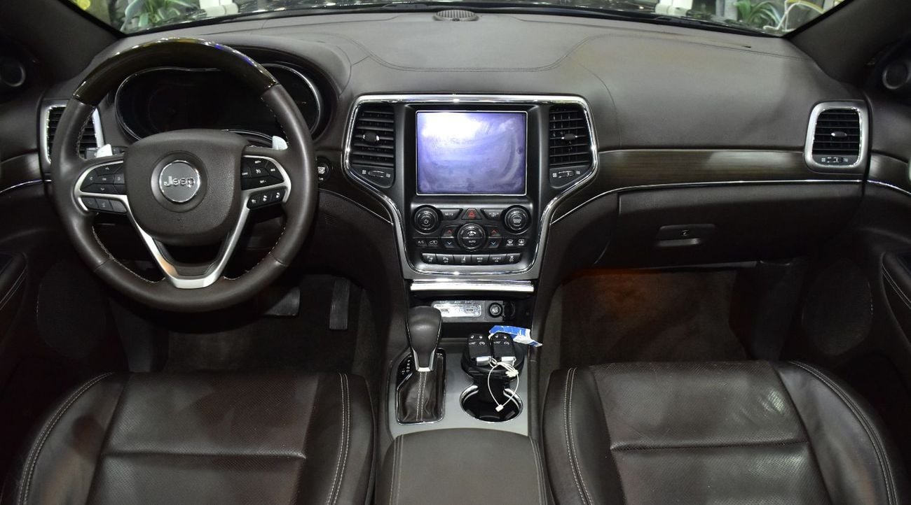 Jeep Grand Cherokee EXCELLENT DEAL for our Jeep Grand Cherokee Overland 4x4 ( 2018 Model ) in Black Color GCC Specs