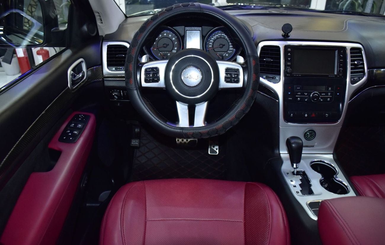 Jeep Grand Cherokee EXCELLENT DEAL for our Jeep Grand Cherokee SRT8 ( 2012 Model ) in Black Color GCC Specs