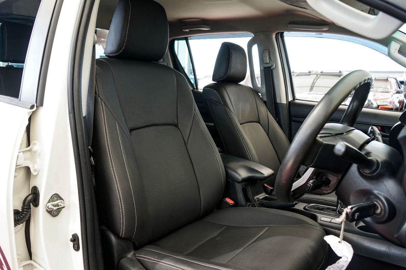 تويوتا هيلوكس The Toyota Hilux is a legendary, mid-size pickup truck known for its exceptional ruggedness, durabli