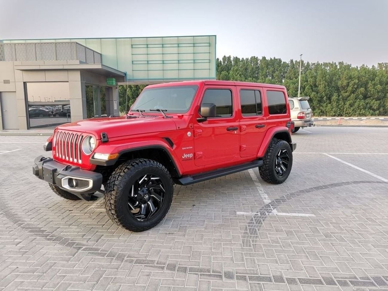 Used Jeep Wrangler Sahara - 2021 - Red 2021 for sale in Sharjah - 772677