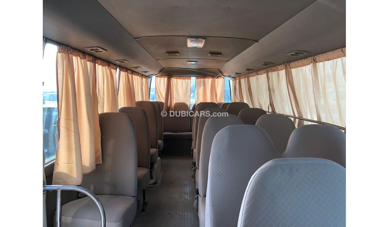 Toyota Coaster 4.2L Diesel, DVD + Rear Camera, Manual, MP3 Interface, DVD, CD Player, Tuner Radio, PARA ANGOLA