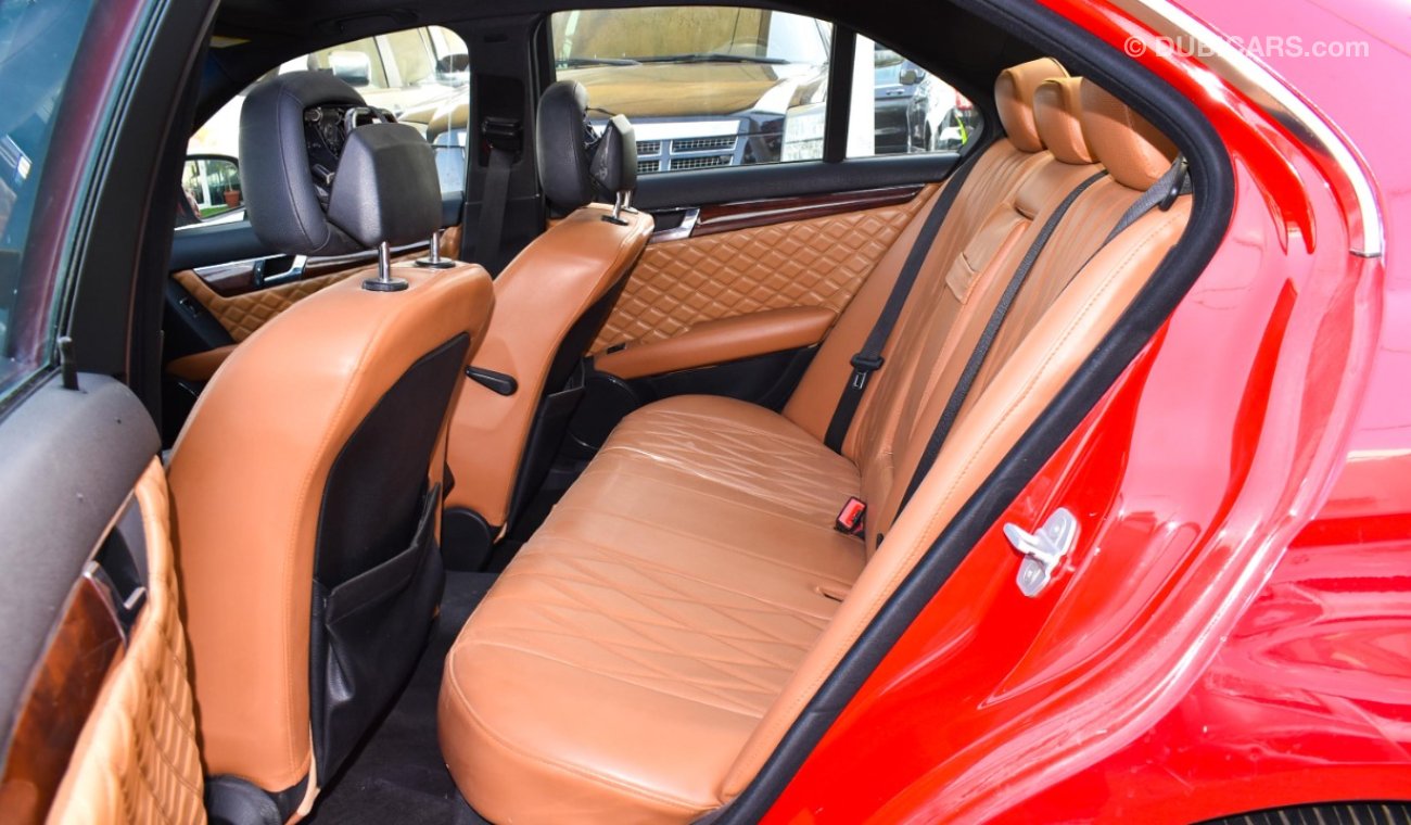 Mercedes-Benz C 300 2009 model, red color, number one, panorama, leather, cruise control, sensor wheels, in excellent co