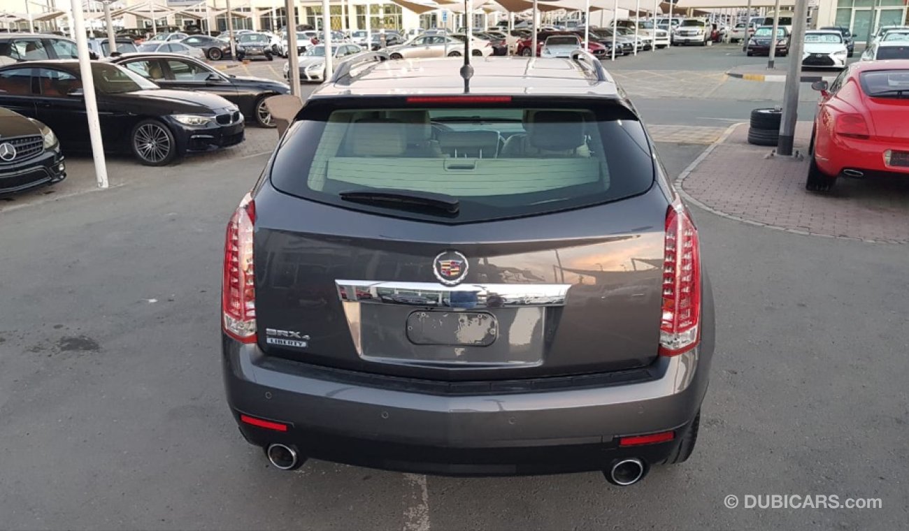 Cadillac SRX Caddillac SRX model 2011 GCC car prefect condition full option low mileage panoramic roof leather s