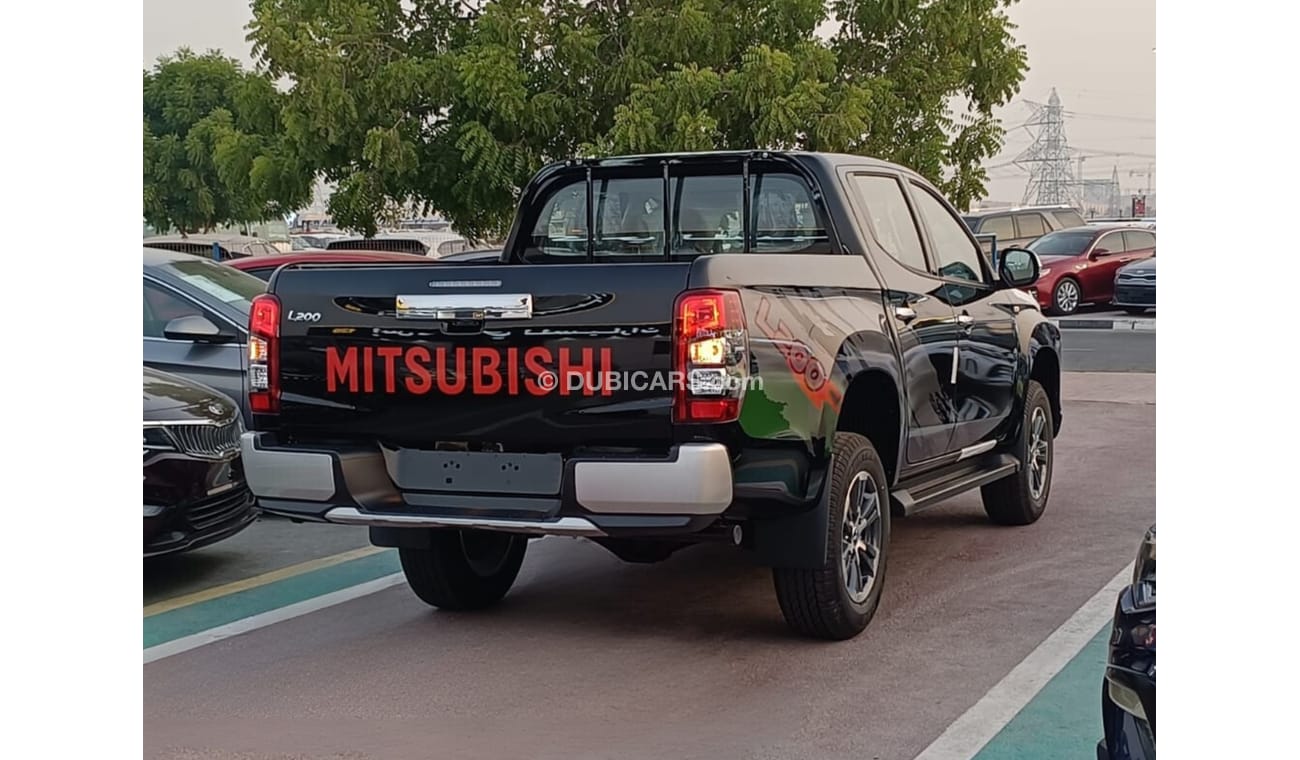Mitsubishi L200 GLX 2.5L Diesel / M/T / 4WD / Black Rims / Steering Vol Control (Code # L2DDB)