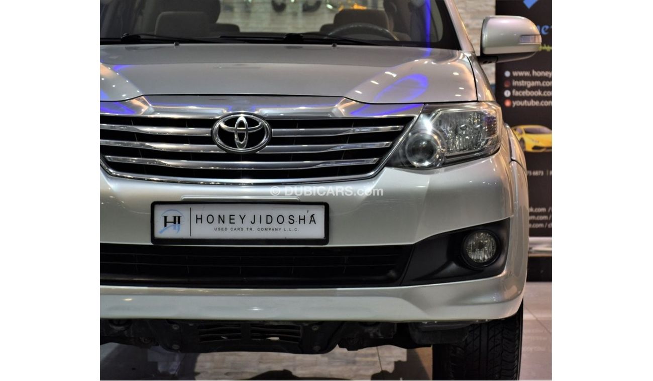 تويوتا فورتونر EXCELLENT DEAL for our Toyota Fortuner SR5 ( 2013 Model! ) in Golden Color! GCC Specs