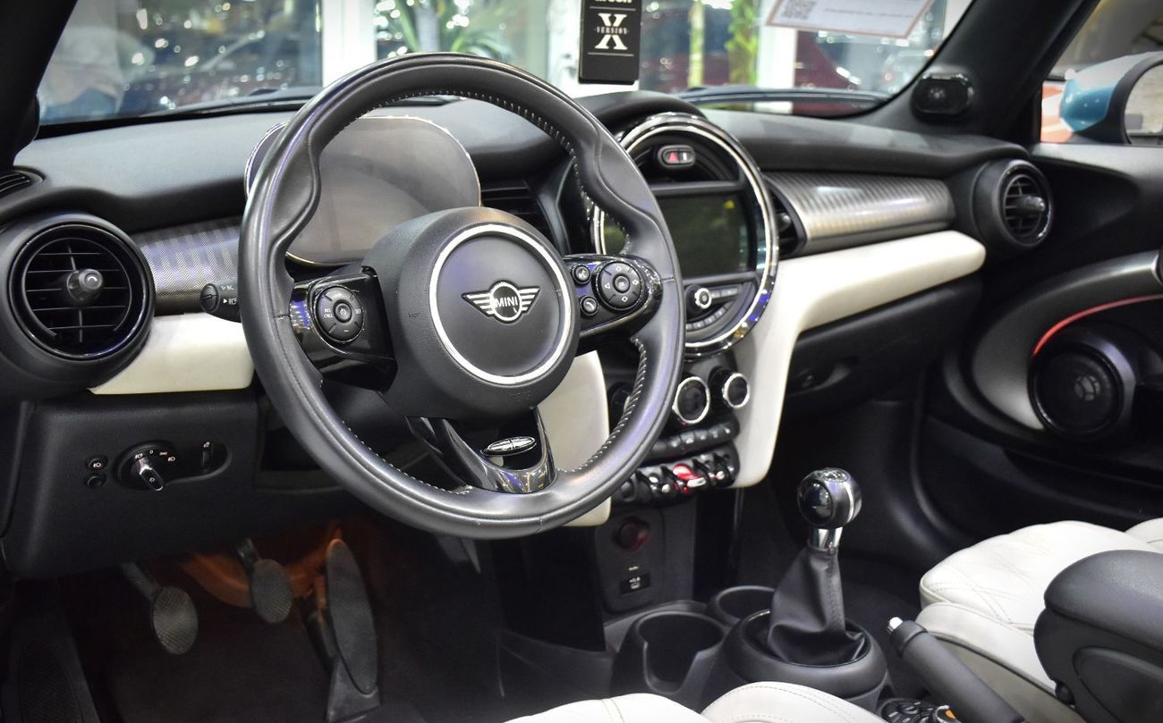 Mini Cooper Cabrio EXCELLENT DEAL for our Mini Cooper Cabrio ( 2021 Model ) in Blue Color American Specs