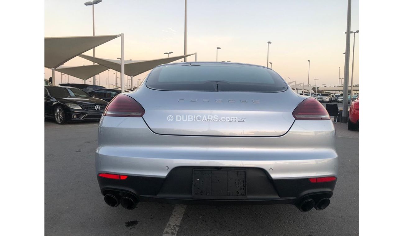 بورش باناميرا موديل 2014 خليجي فل مواصفات كراسي جلد ومثبت سرعه وتحكم كهربي كامل ونظام صوت ممتاز وكاميرا خلفيه ومثب