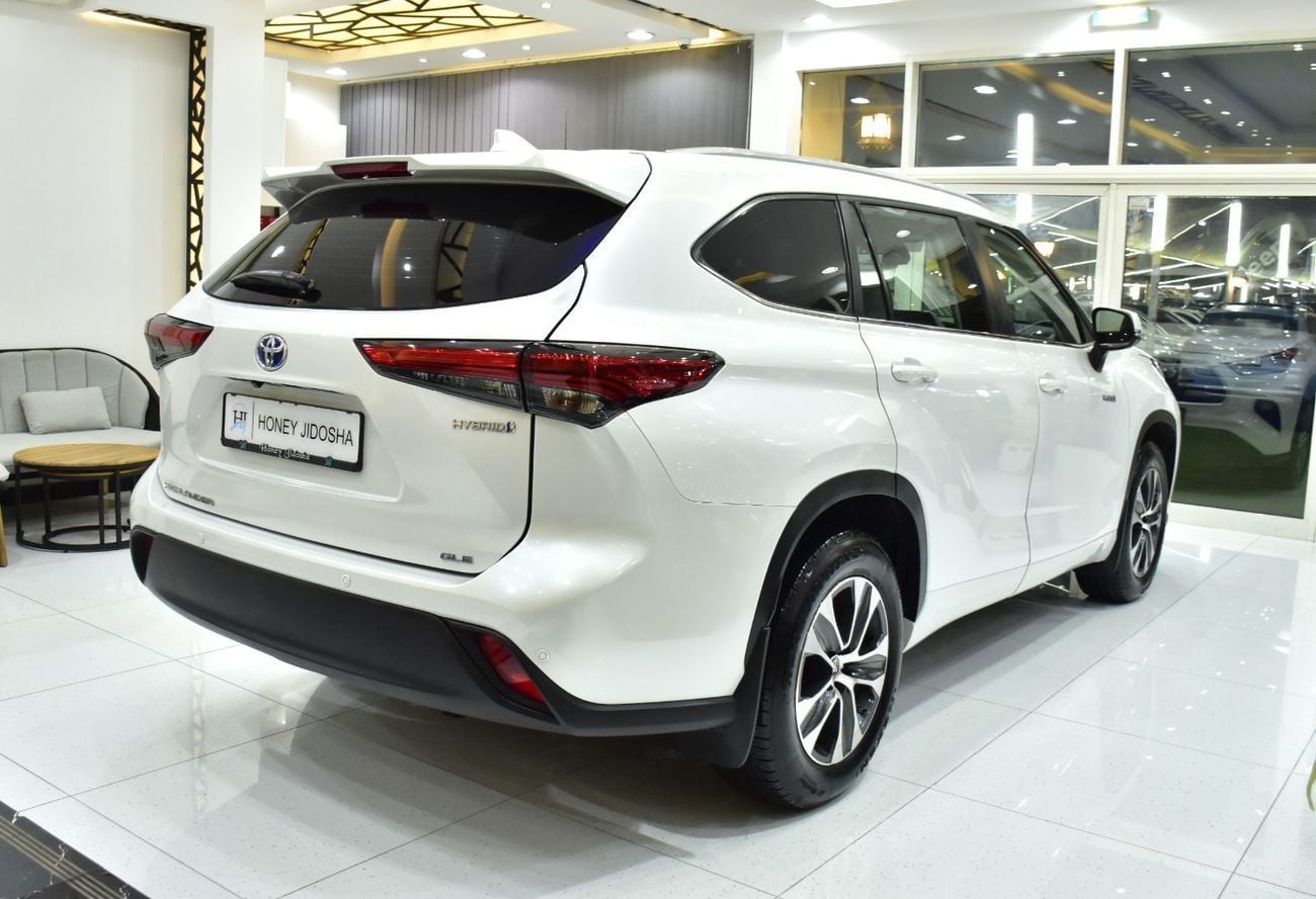 Toyota Highlander GLE HEV EXCELLENT DEAL for our Toyota Highlander Hybrid ( 2023 Model ) in White Color GCC Specs