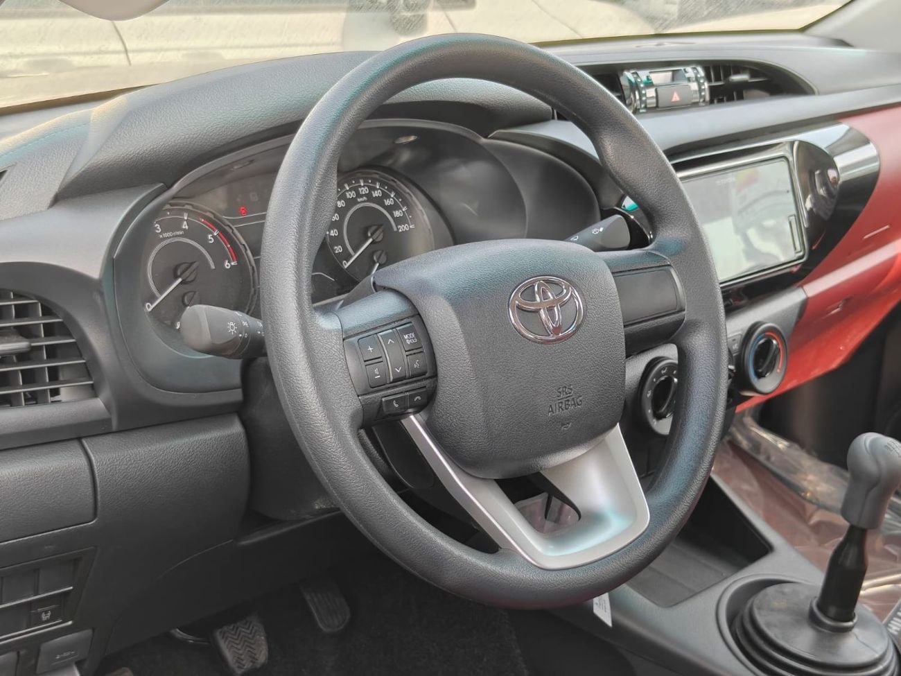 تويوتا هيلوكس 2026 Toyota Hilux white/red 2.4L diesel manual GCC spec mid option