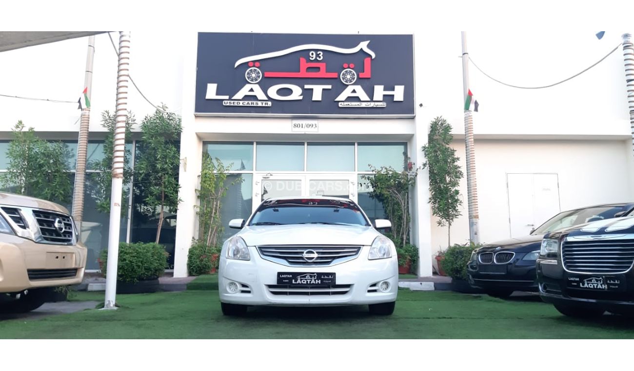 Nissan Altima Without accidents No.2, white color inside beige, fingerprint, cruise control, rear wing control, se