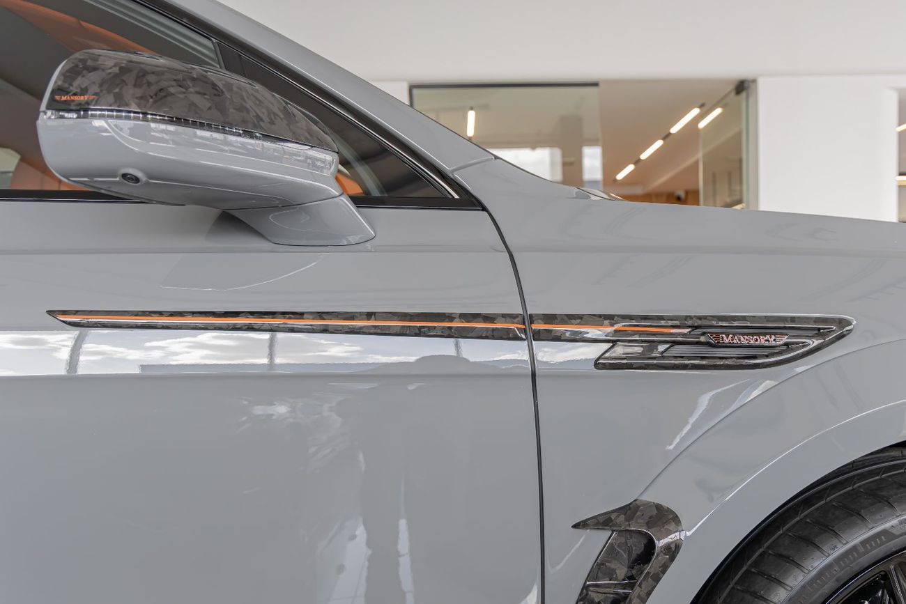 Bentley Bentayga ORIGINAL MANSORY  Bentayga - Crystal-Cut Headlights, Carbonado Evo Bespoke Carbon Exterior - 2025