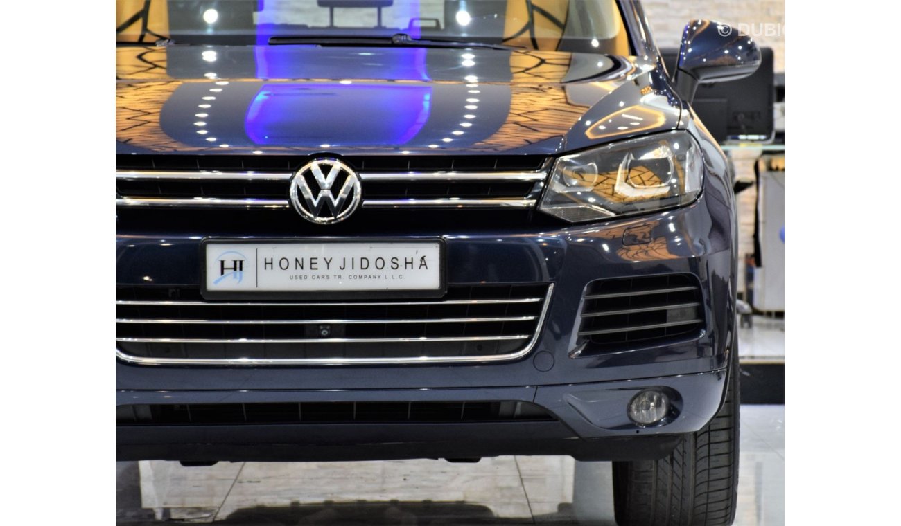 Volkswagen Touareg SEL EXCELLENT DEAL for our Volkswagen Touareg ( 2015 Model! ) in Blue Color! GCC Specs