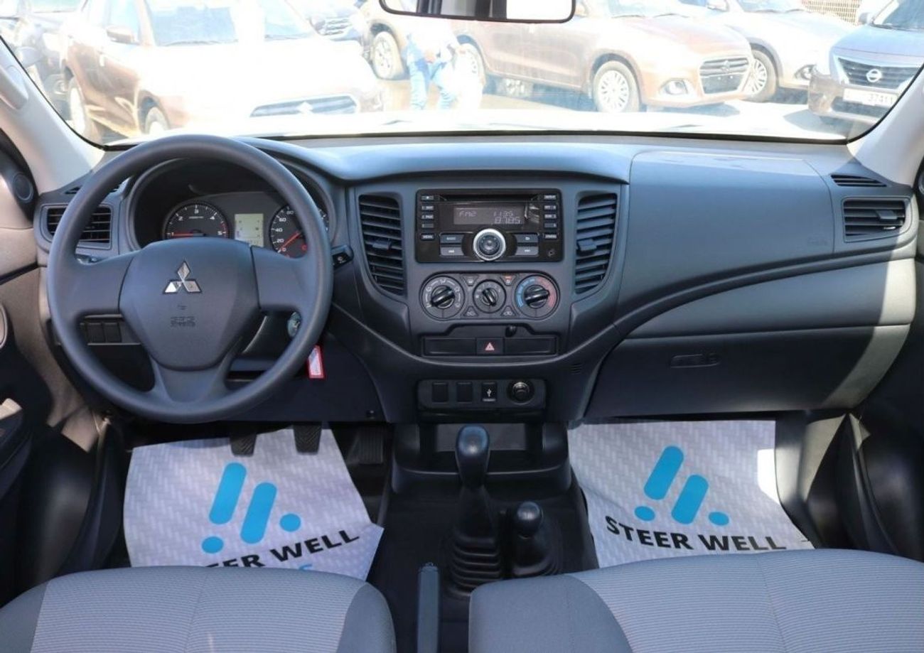 ميتسوبيشي L200 DIESEL - 2.4L -  DOUBLE CABIN - 4X4 - 5MT - POWER LOCKS AND POWER WINDOWS - EXPORT ONLY