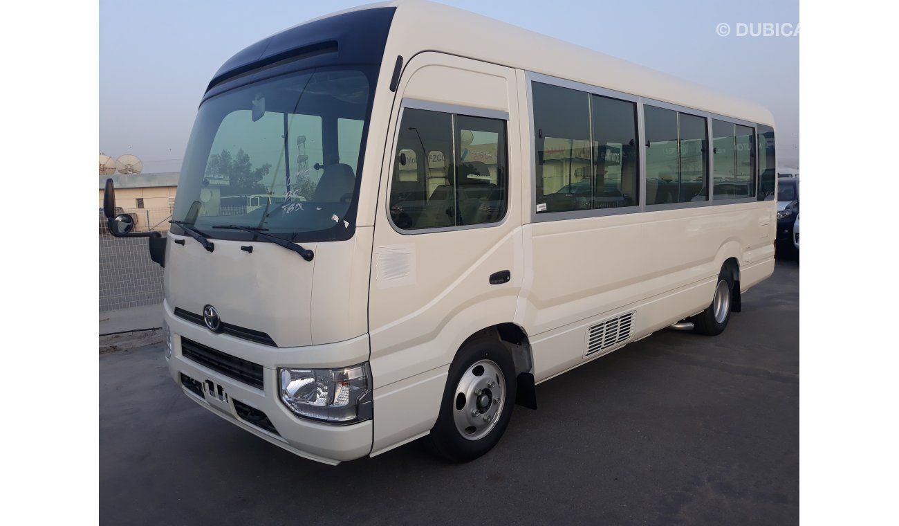 Toyota Coaster DIESEL 4.2L WITH AIR BAGS ABS AND POWER DOOR