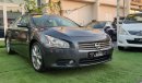 Nissan Maxima Gulf - number one - slot - leather - screen - cruise control - in excellent condition, you do not ne