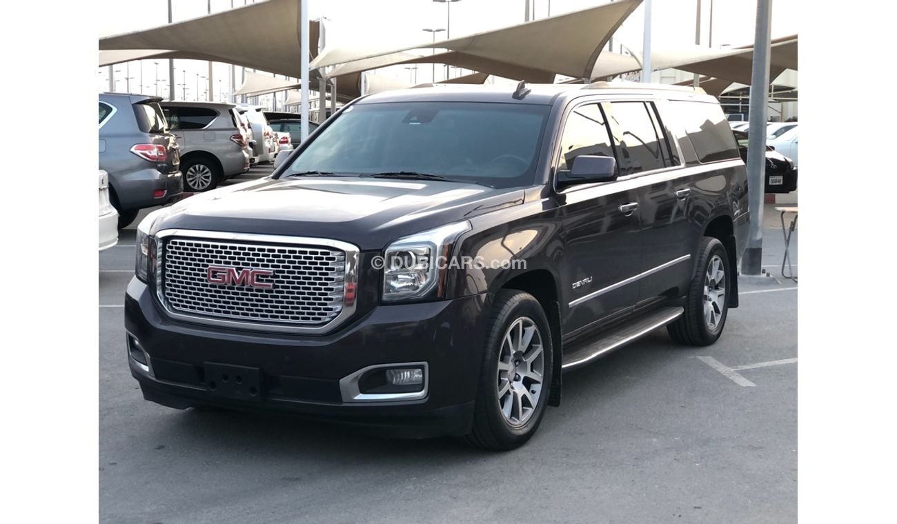 جي أم سي يوكون موديل 2015 فل مواصفات كراسي جلد ومثبت سرعه وتحكم كهربي كامل ونظام صوت ممتاز وكاميرا خلفيه ومدخل اسطو