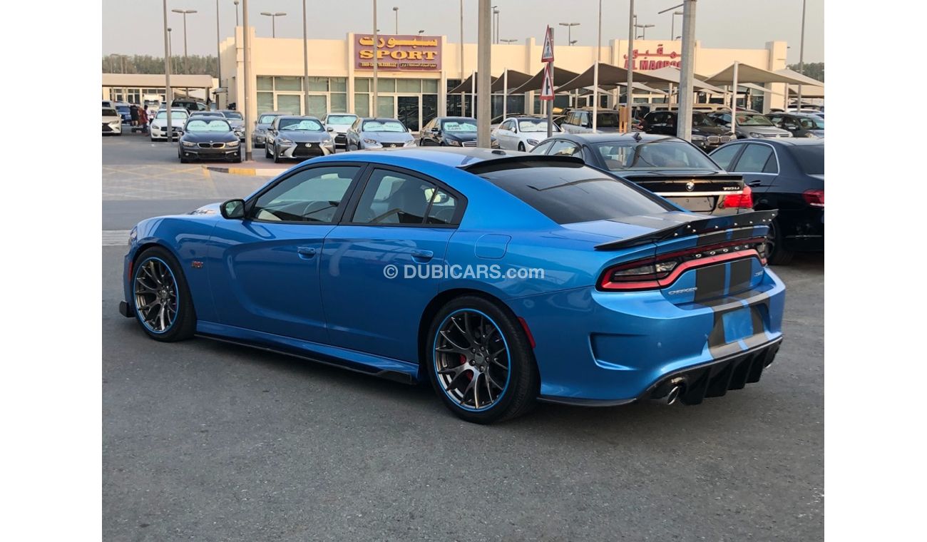 دودج تشارجر موديل 2015 خليجي فل مواصفات كراسي جلد ومثبت سرعه وتحكم كهربي كامل ونظام صوت ممتاز وكاميرا خلفيه