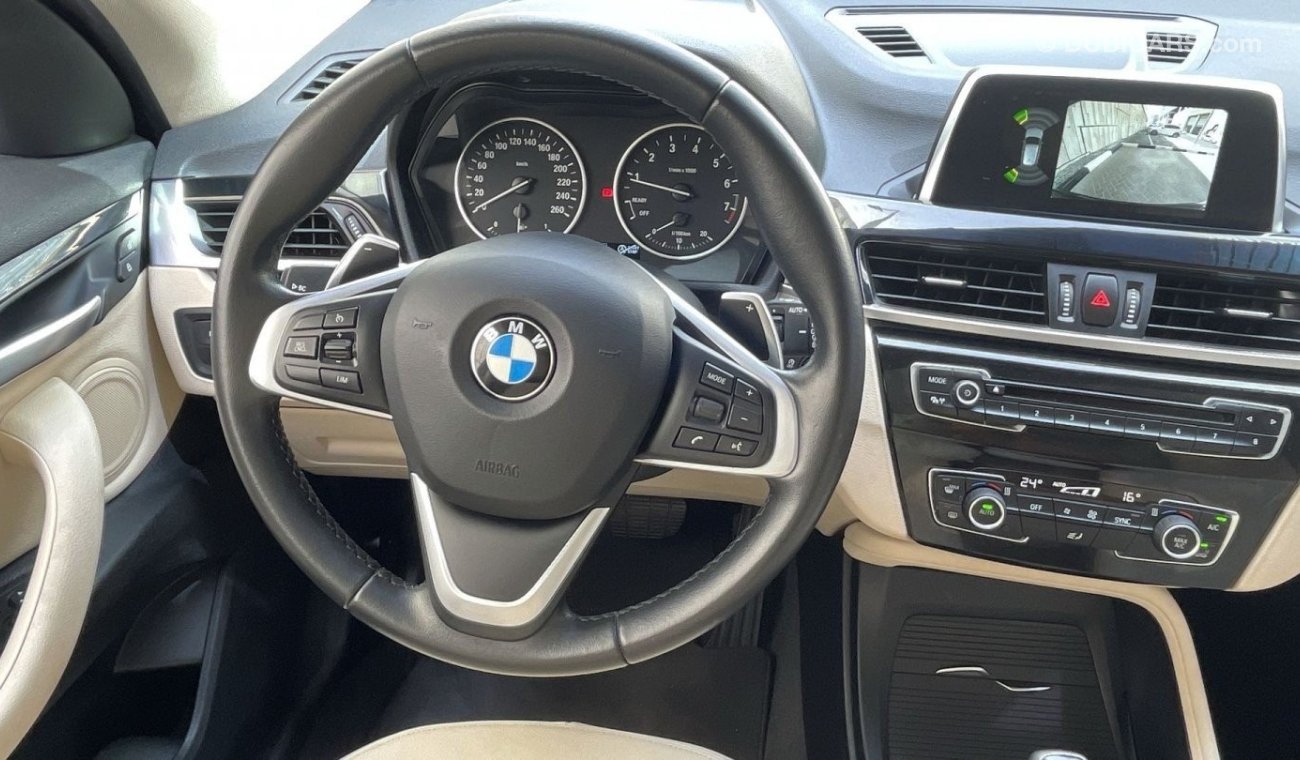 BMW X1 2.0L | GCC | EXCELLENT CONDITION | FREE 2 YEAR WARRANTY | FREE REGISTRATION | 1 YEAR COMPREHENSIVE I