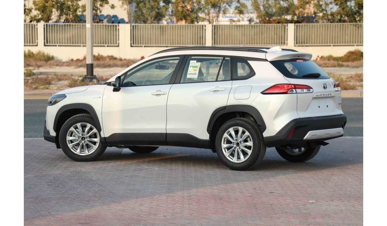 تويوتا كورولا كروس 2024 TOYOTA COROLLA CROSS 1.8 Hybrid MID - PLATINUM WHITE PEARL inside RED | Export Only