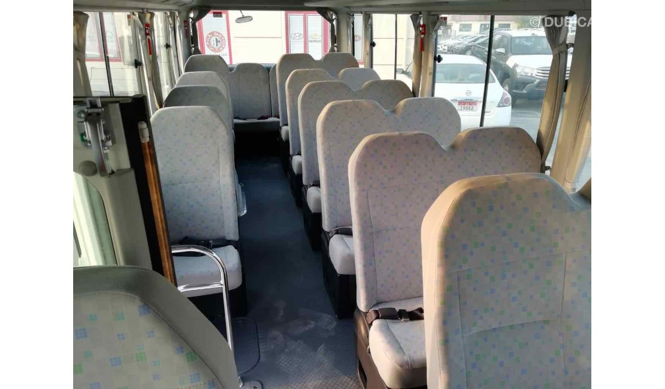 Toyota Coaster 23 seats High Roof Diesel full Option