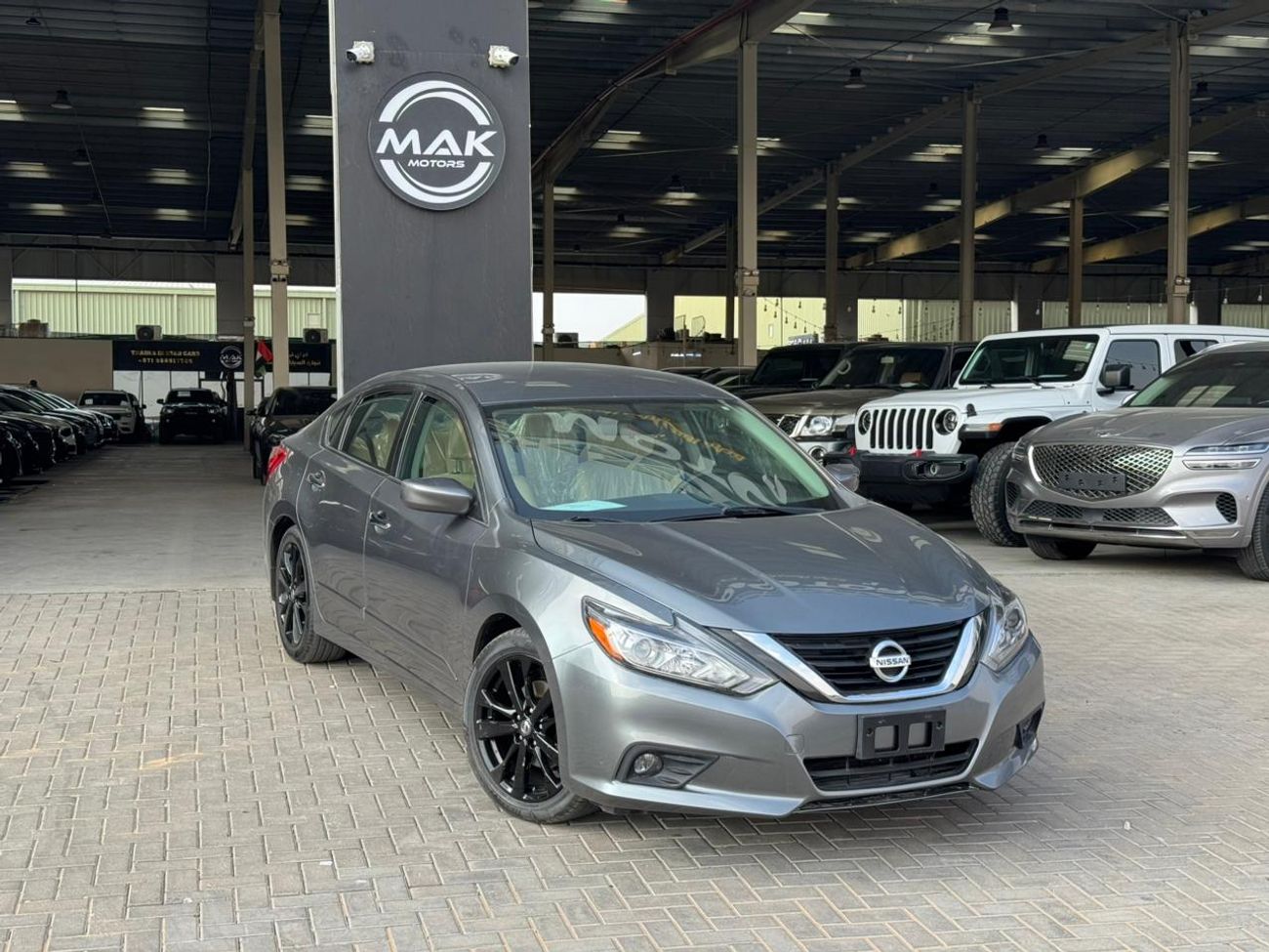 Nissan Altima SR 2.5L SR / V4 2.5L / PADDLE SHIFTERS / KEYLESS ENTRY / LEATHER / RIMS / KEYLESS START