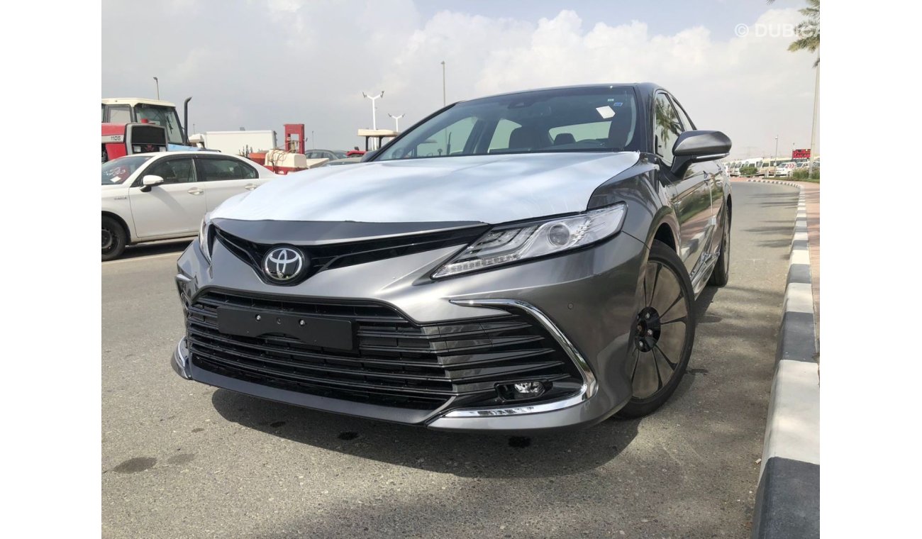 تويوتا كامري TOYOTA_CAMERY_GRANDE_2023_3.5L_avaialable_white_black_hybrid