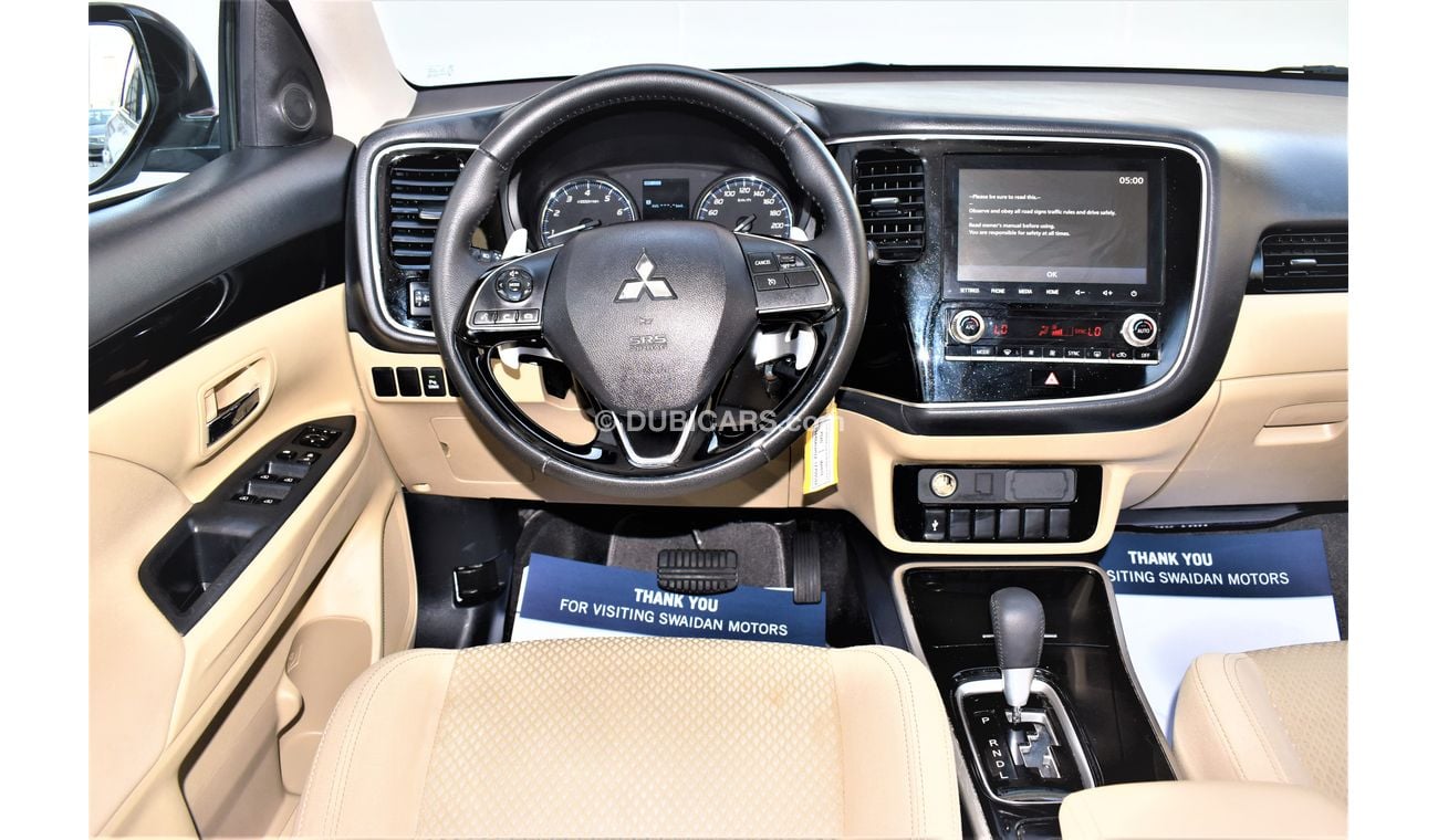 Mitsubishi Outlander AED 1119 PM | 2.4L GLX 4WD 7-STR GCC DEALER WARRANTY
