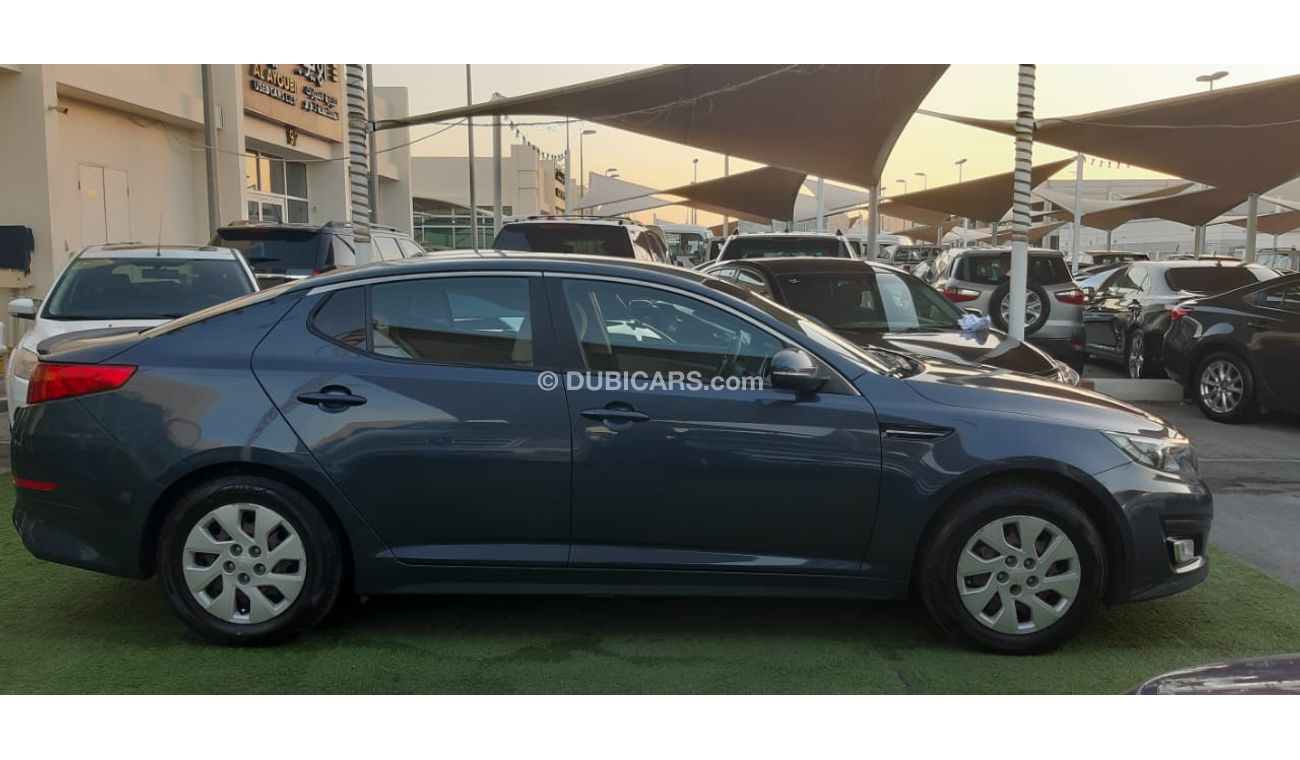 كيا أوبتيما خليجى رقم 2  شاشة   كاميرا  مثبت  سرعة  جناح خلفى رنجات حساسات أنوار ضباب بحالة ممتازة