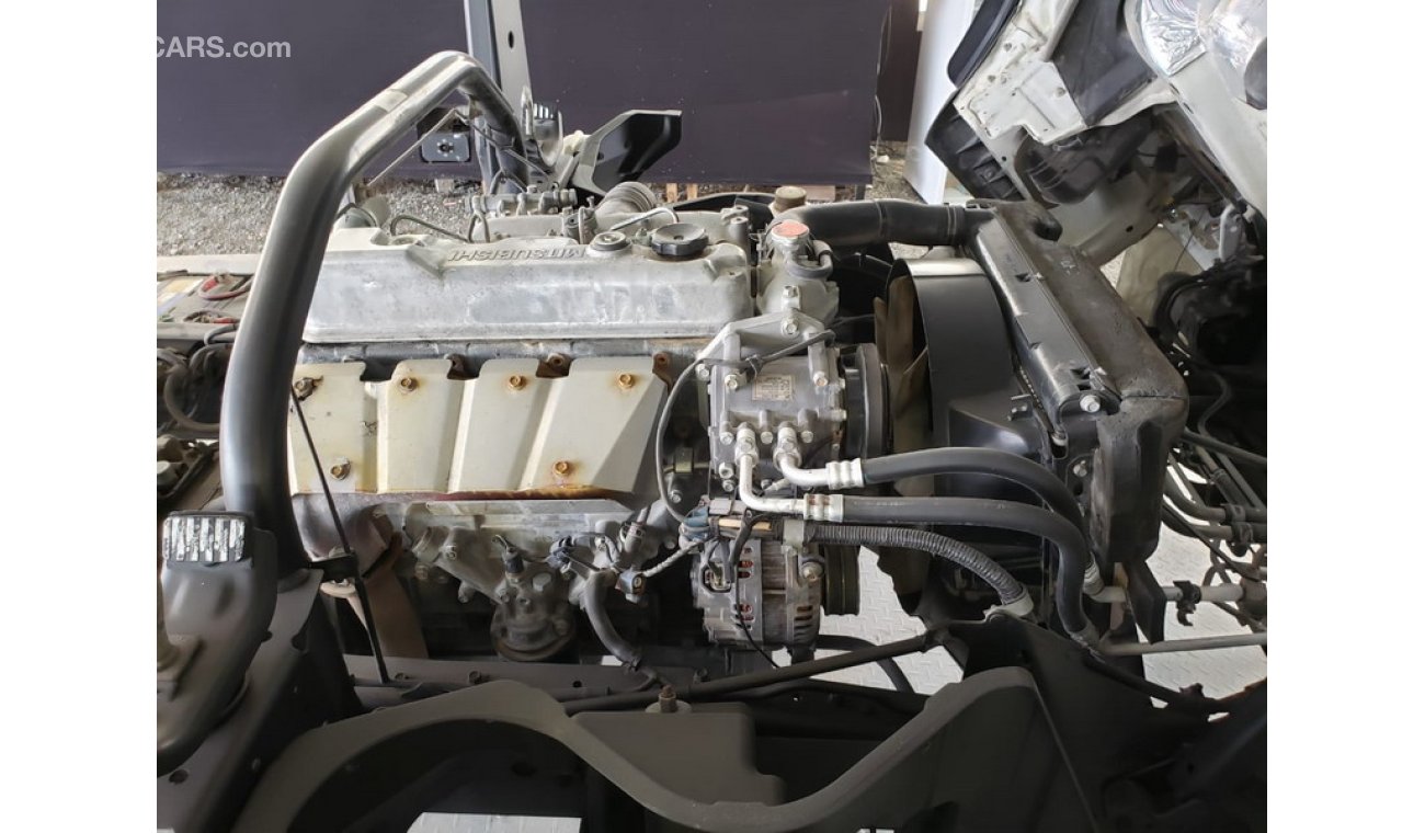 Mitsubishi Fuso Canter 4.5L Diesel, 4 Ton, 16" Tyre, 5 Speed Manual Transmission, Reverse Warning Buzzer (LOT # 2014)