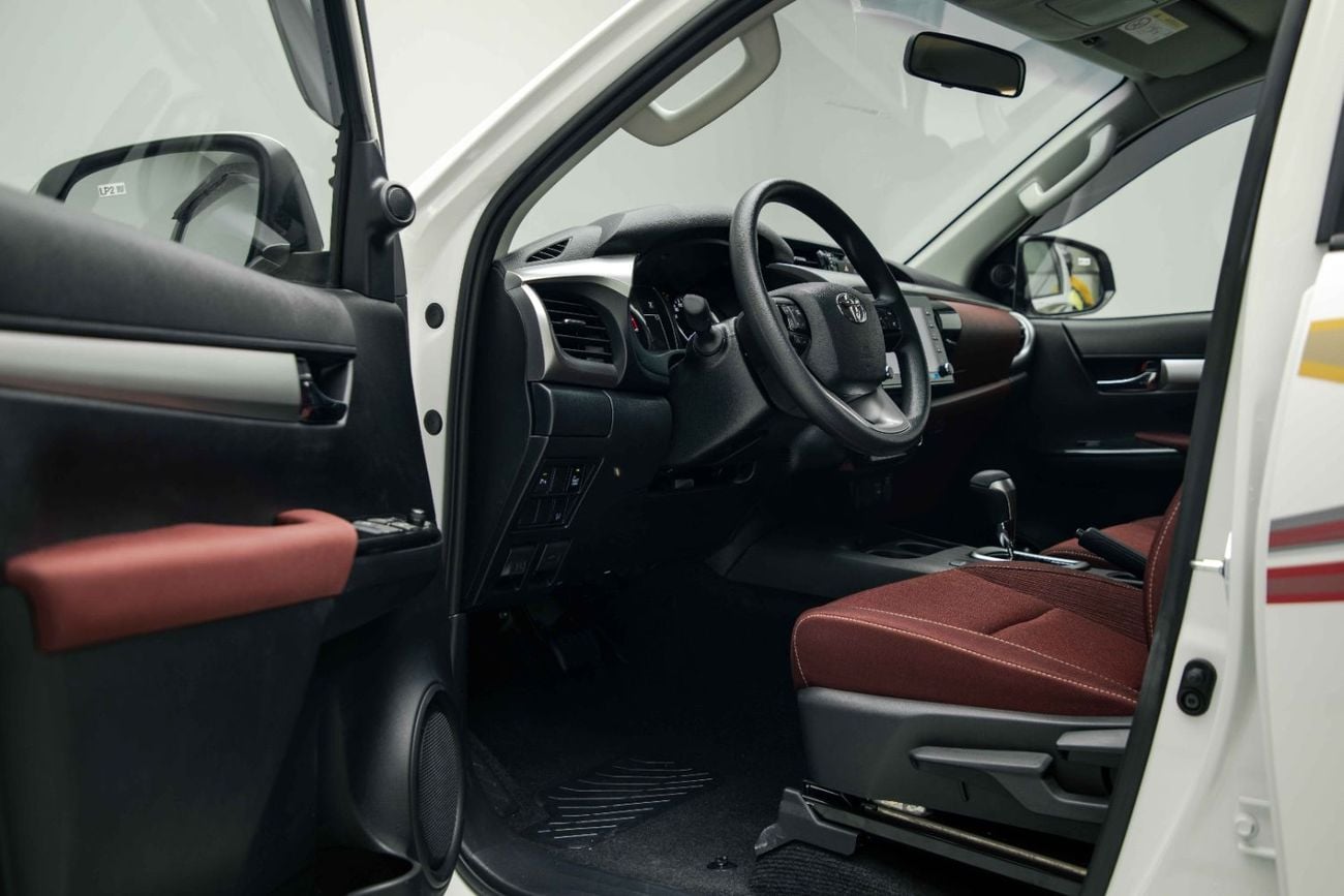 Toyota Hilux 2.4L - Platinum White Inside Maroon | Export Only