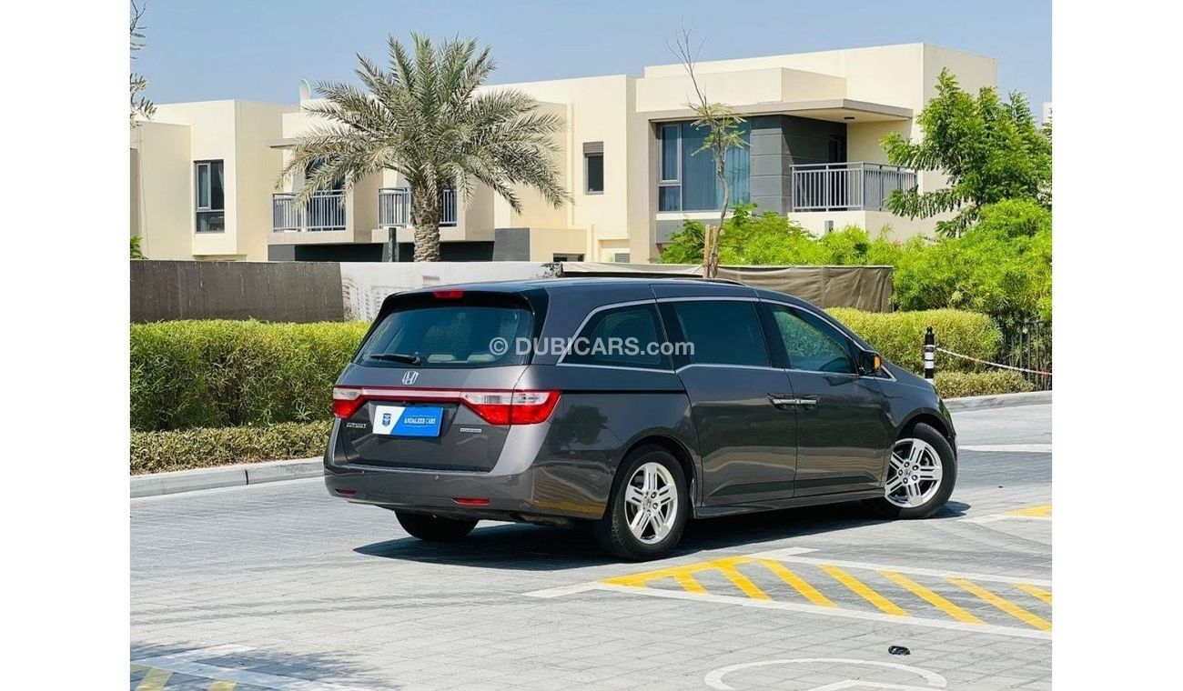 Honda Odyssey Touring 1385 P.M ODYSSEY 3.5L ll TOPEND ll AUTOMATIC DOORS ll GCC ll WELL MAINTAINED