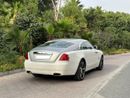 رولز رويس واريث 2015 Rolls Royce Wraith | GCC Specs | 6.6L V12 | 624 HP | 66k KM | WHITE/RED | Starlight Headliner |