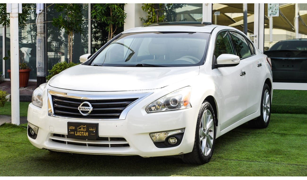 Nissan Altima White color inside Big Ward No.1 fingerprint slot, leather alloy wheels, camera screen control senso