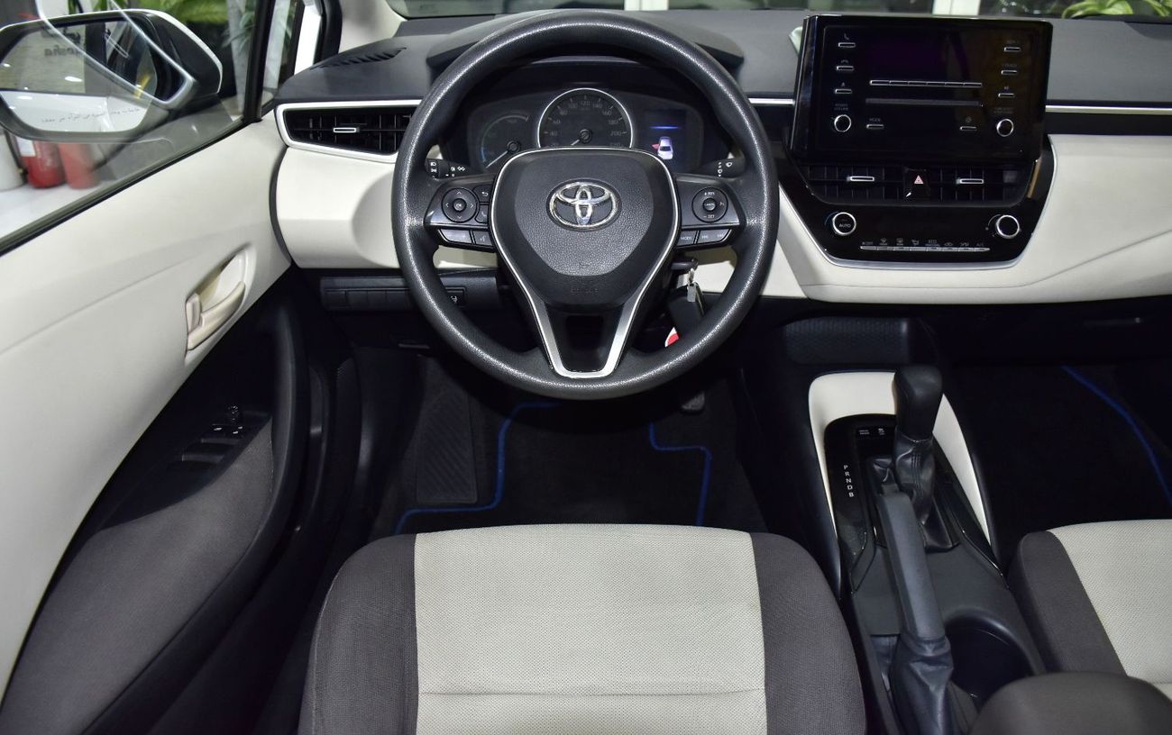 تويوتا كورولا EXCELLENT DEAL for our Toyota Corolla Hybrid ( 2020 Model ) in White Color GCC Specs