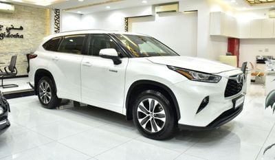 Toyota Highlander GLE HEV EXCELLENT DEAL for our Toyota Highlander Hybrid ( 2023 Model ) in White Color GCC Specs