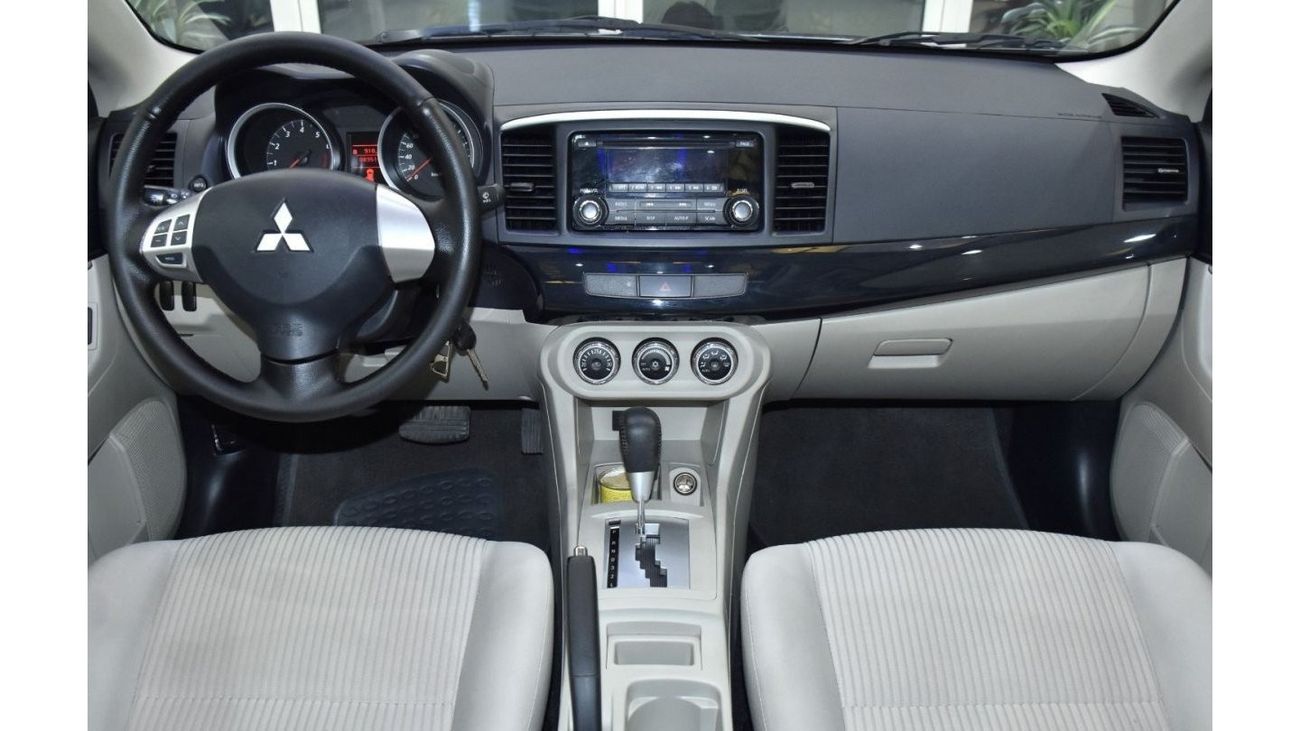 Mitsubishi Lancer EXCELLENT DEAL for our Mitsubishi Lancer GLS ( 2016 Model ) in Silver Color GCC Specs